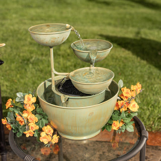 Outdoor water fountain with decorative elements on a patio