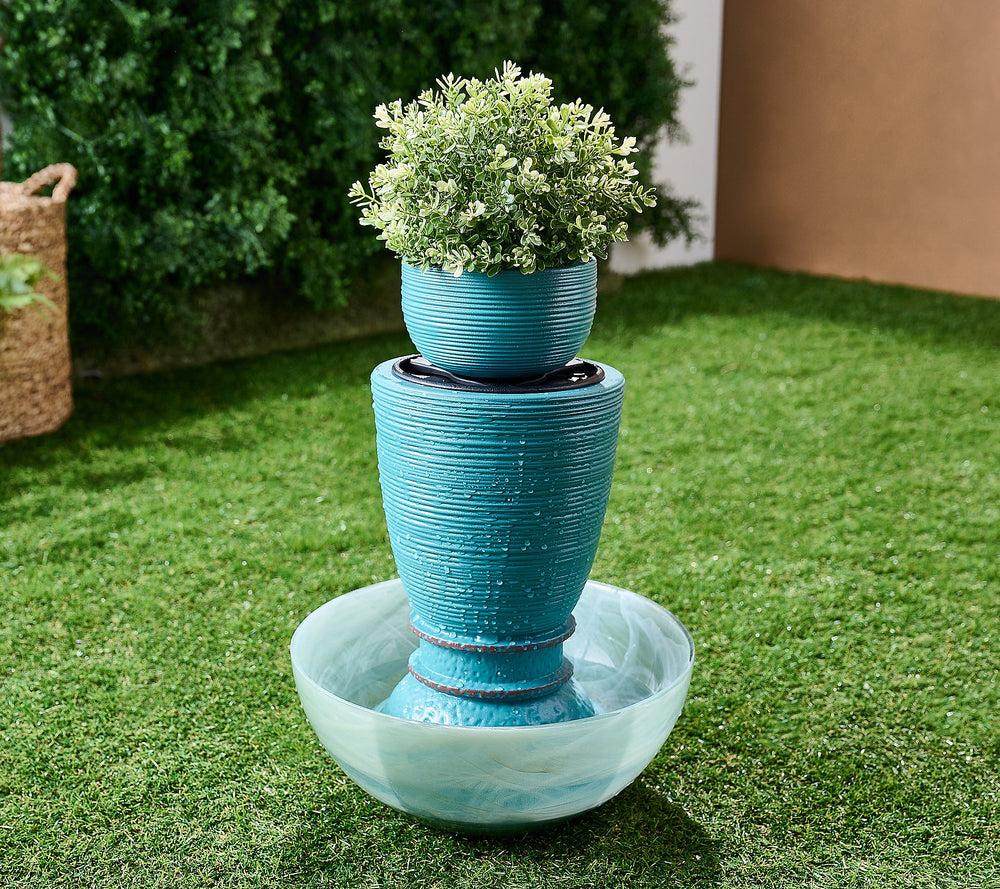 Blue Padua fountain in a small bowl with a mini planter on top.
