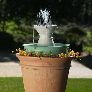 Fountain with water feature in a garden setting